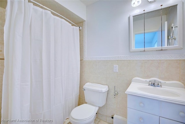 bathroom featuring vanity, toilet, tile walls, and a shower with shower curtain