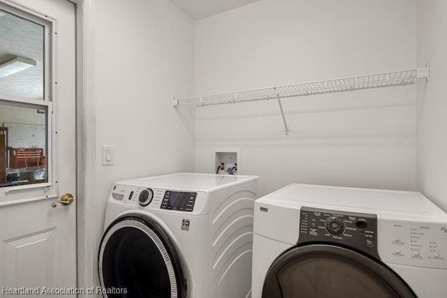 laundry room with laundry area and washer and dryer