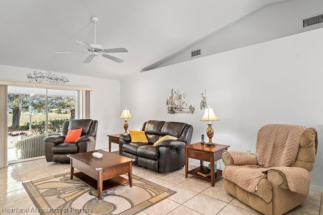 living area featuring lofted ceiling, visible vents, ceiling fan, and light tile patterned floors