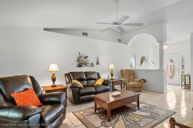 living area featuring light tile patterned floors, decorative columns, visible vents, lofted ceiling, and ceiling fan