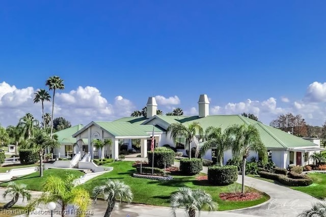 exterior space with a yard and driveway