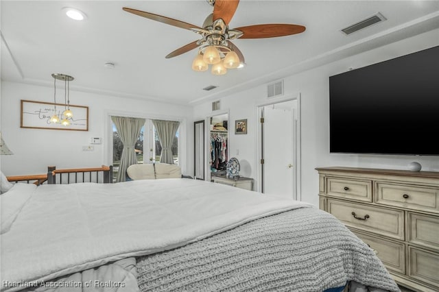 bedroom featuring visible vents and a ceiling fan