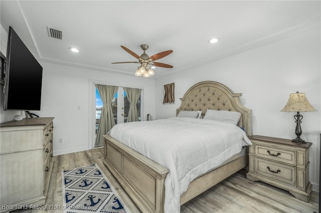bedroom with visible vents, recessed lighting, access to outside, and light wood-style floors