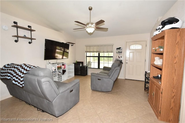 259 Condor Ave, Sebring, FL 33870 - living area with lofted ceiling, ceiling fan, and light tile patterned flooring