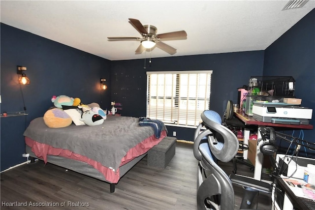 259 Condor Ave, Sebring, FL 33870 - bedroom featuring wood finished floors, a ceiling fan, and baseboards