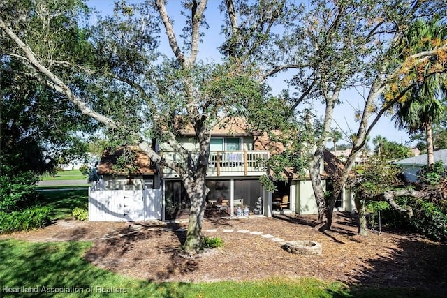 rear view of house with a deck