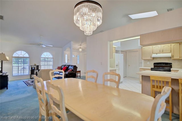dining area with visible vents, a ceiling fan, and light tile patterned floors