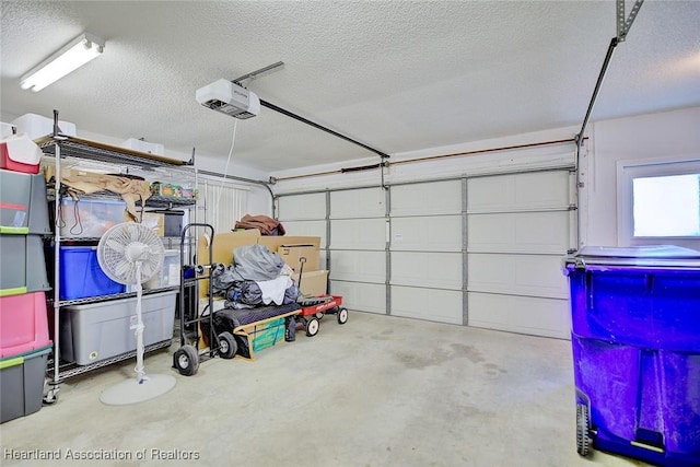 garage featuring a garage door opener