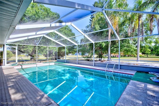pool featuring glass enclosure