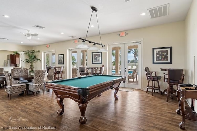 rec room with french doors, hardwood / wood-style flooring, ceiling fan, and billiards