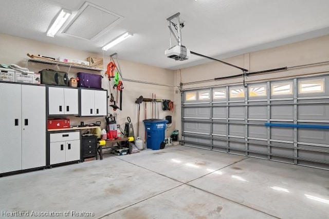 garage featuring a garage door opener