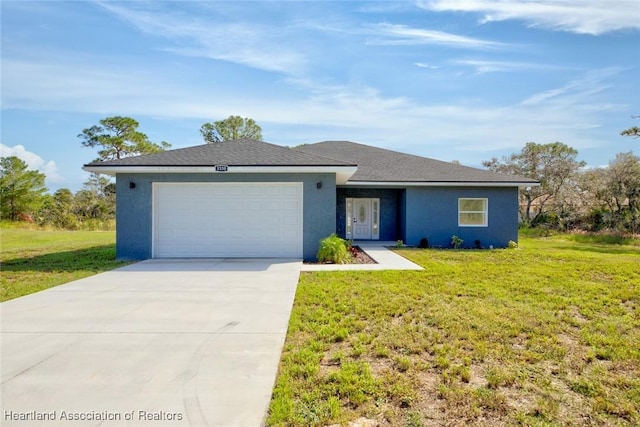 single story home with a front yard and a garage