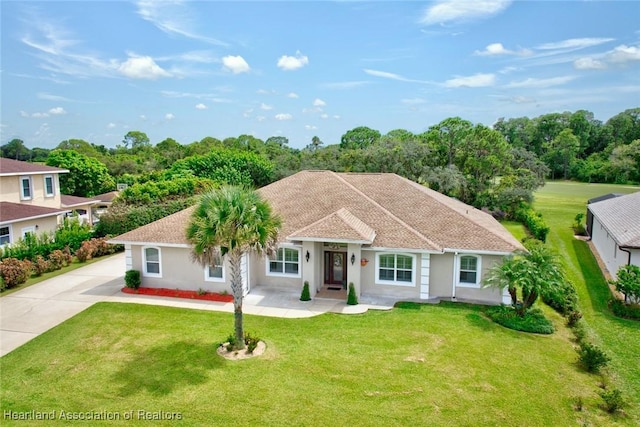 view of front of home with a front lawn