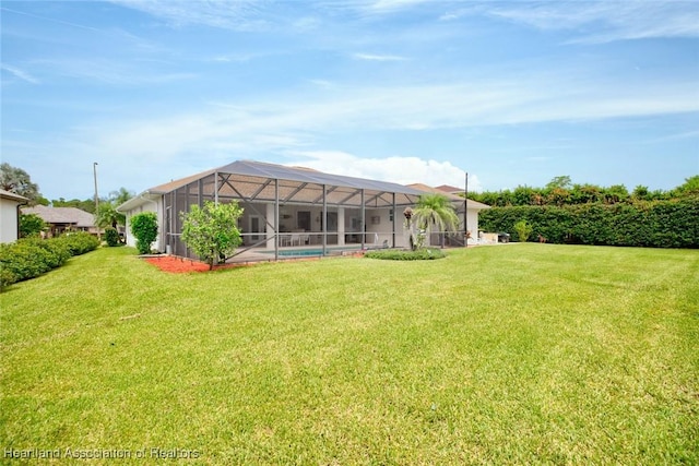 view of yard featuring glass enclosure