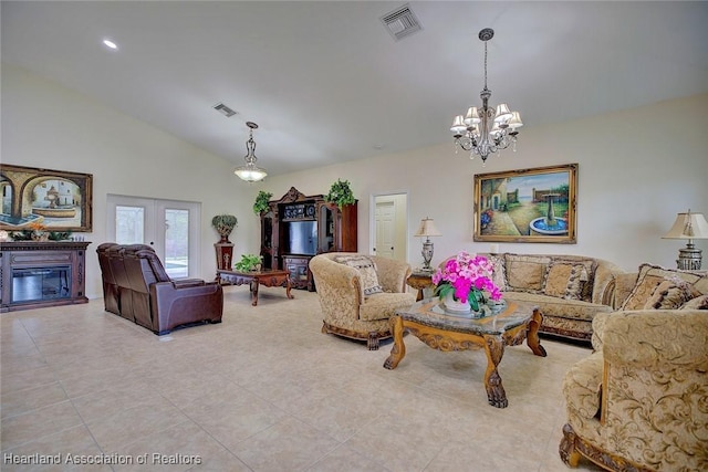 tiled living room featuring vaulted ceiling, french doors, and a chandelier