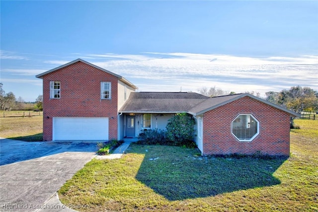 view of front of property with driveway, brick siding, a garage, and a front lawn