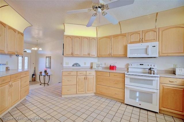 kitchen featuring ceiling fan with notable chandelier, light brown cabinetry, white appliances, and decorative light fixtures