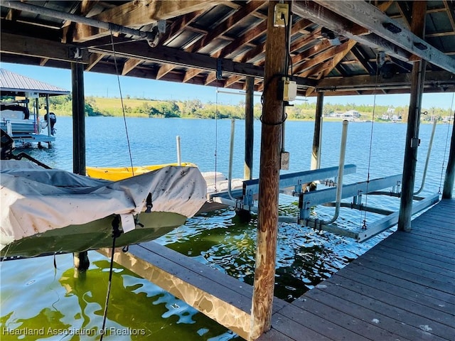 dock area featuring a water view