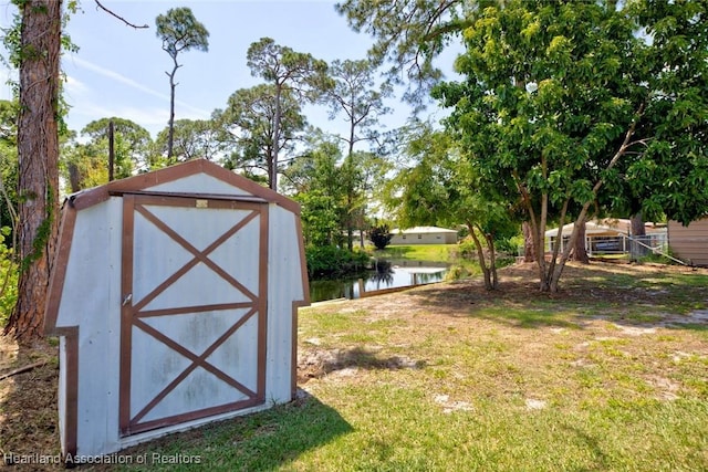 view of shed featuring a water view