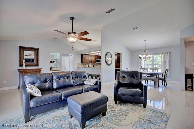 living room featuring light tile patterned floors, lofted ceiling, and visible vents