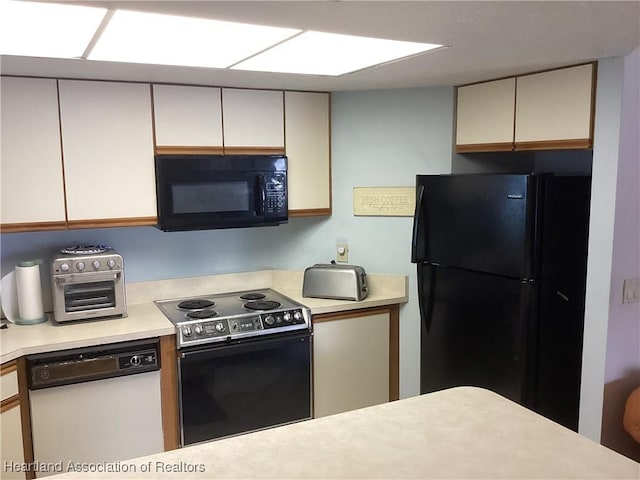 kitchen featuring black appliances