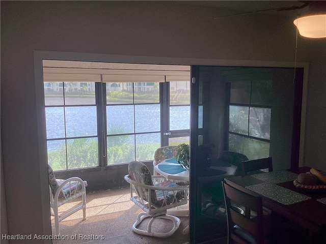 dining area with a water view