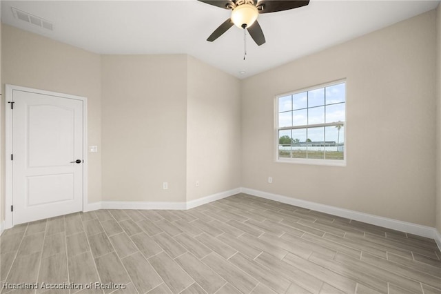 4825 Whiting Dr, Sebring, FL 33870 - empty room with baseboards, ceiling fan, visible vents, and wood finish floors