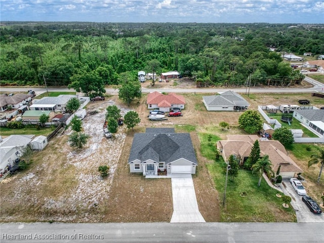 4825 Whiting Dr, Sebring, FL 33870 - bird's eye view with a view of trees and a residential view
