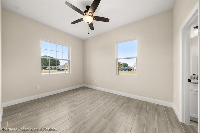 4825 Whiting Dr, Sebring, FL 33870 - unfurnished room with baseboards, light wood-style flooring, and ceiling fan