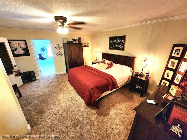 carpeted bedroom featuring a textured ceiling, ceiling fan, crown molding, and connected bathroom