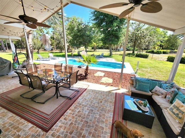 view of patio / terrace featuring an outdoor living space and ceiling fan