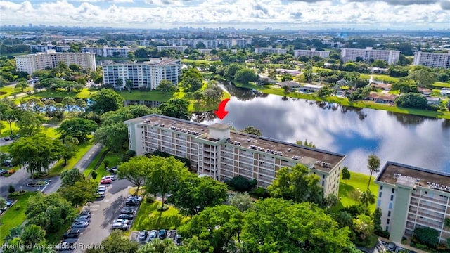 birds eye view of property featuring a water view