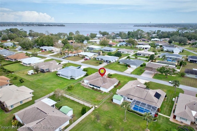 aerial view featuring a water view