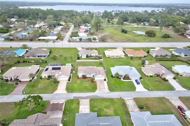 drone / aerial view featuring a water view