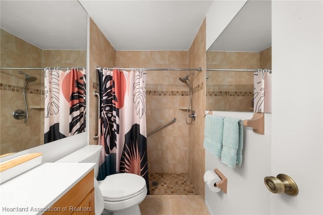 bathroom featuring tile patterned floors, vanity, toilet, and a shower with shower curtain