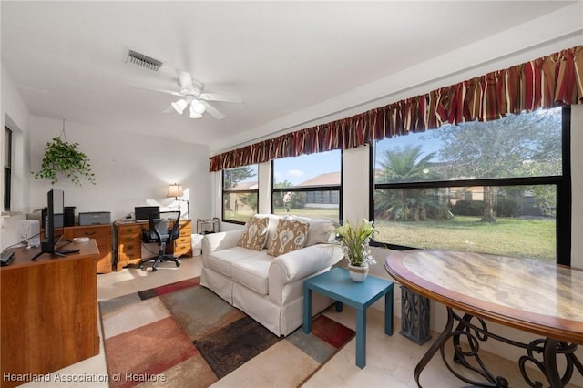 living room with ceiling fan