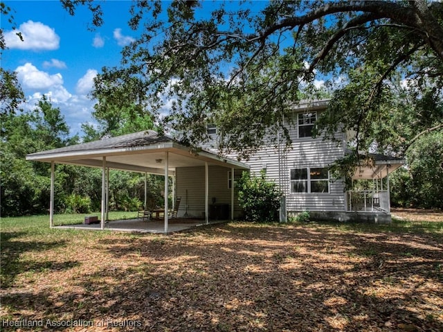 9131 Bridle Path, Sebring, FL 33875 - rear view of property featuring a patio area