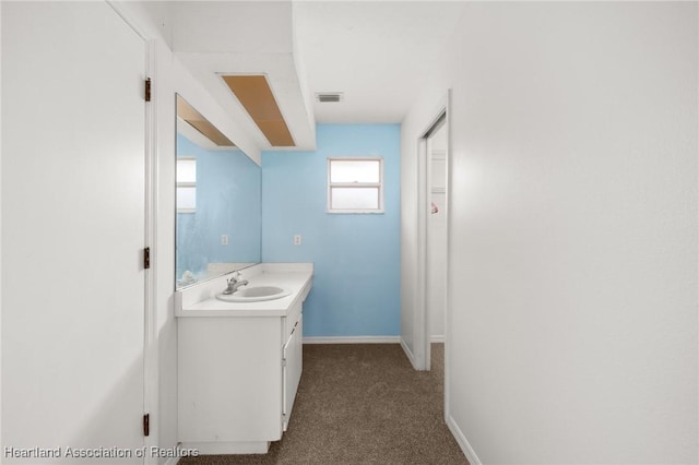 9131 Bridle Path, Sebring, FL 33875 - bathroom with vanity and baseboards