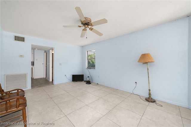 9131 Bridle Path, Sebring, FL 33875 - unfurnished room with a ceiling fan and light tile patterned floors
