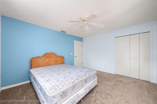 9131 Bridle Path, Sebring, FL 33875 - carpeted bedroom featuring a closet, a ceiling fan, and baseboards