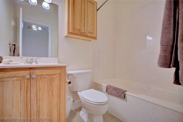 full bathroom with toilet, vanity, bathtub / shower combination, and tile patterned floors