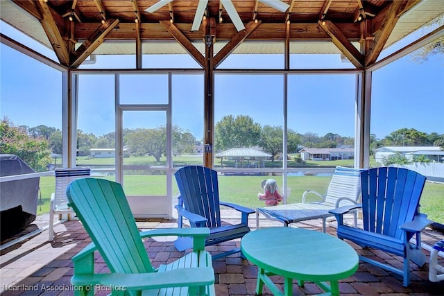 sunroom featuring wood ceiling