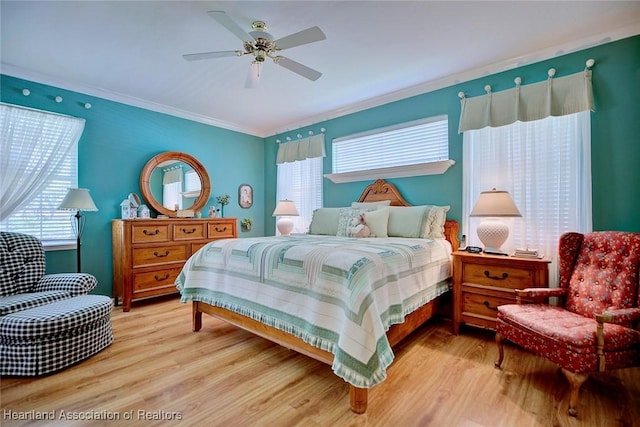 3421 E Glen Eagles Dr, Avon Park, FL 33825 - bedroom featuring wood finished floors, crown molding, and a ceiling fan