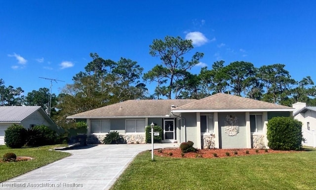 ranch-style house with a front yard