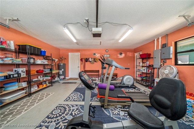 workout area featuring electric panel, water heater, and a textured ceiling