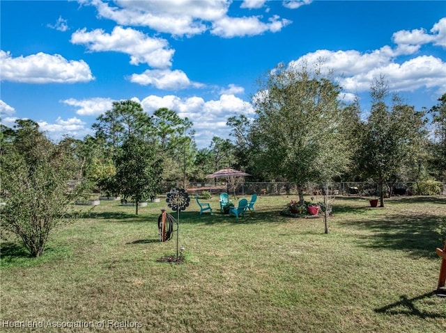 view of community featuring a yard