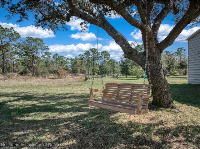 surrounding community with a yard