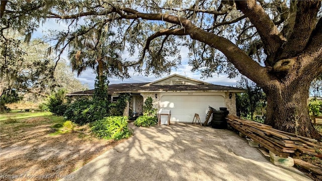 single story home featuring a garage