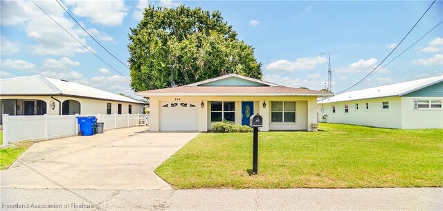 956 Shamrock Dr, Sebring, FL 33875 - view of front of property with a garage and driveway