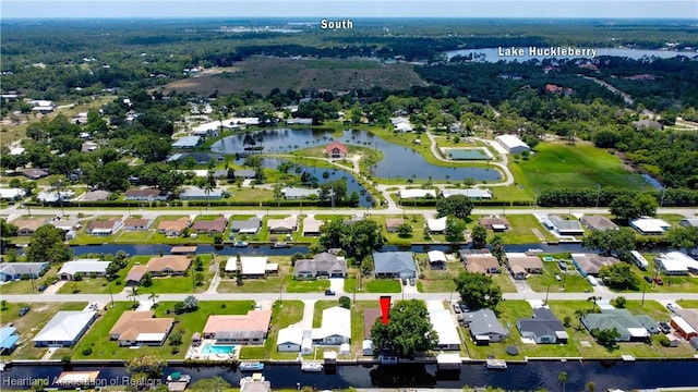 956 Shamrock Dr, Sebring, FL 33875 - aerial view of property and surrounding area featuring a large body of water and nearby suburban area